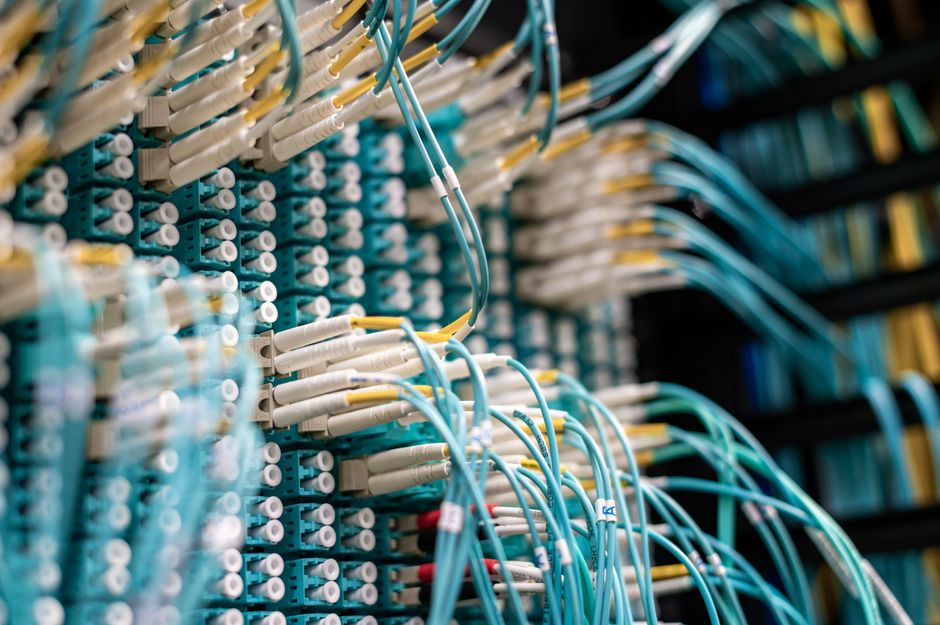 High-density data-center cabling supporting AI cloud infrastructure.