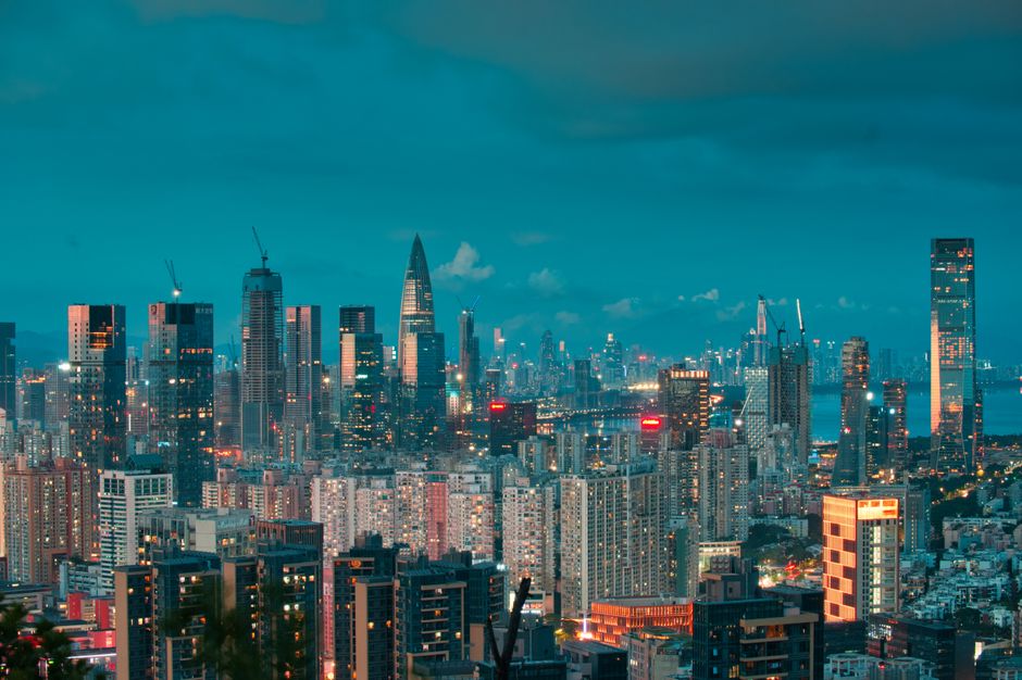 Night cityscape of a major Chinese city with illuminated skyscrapers