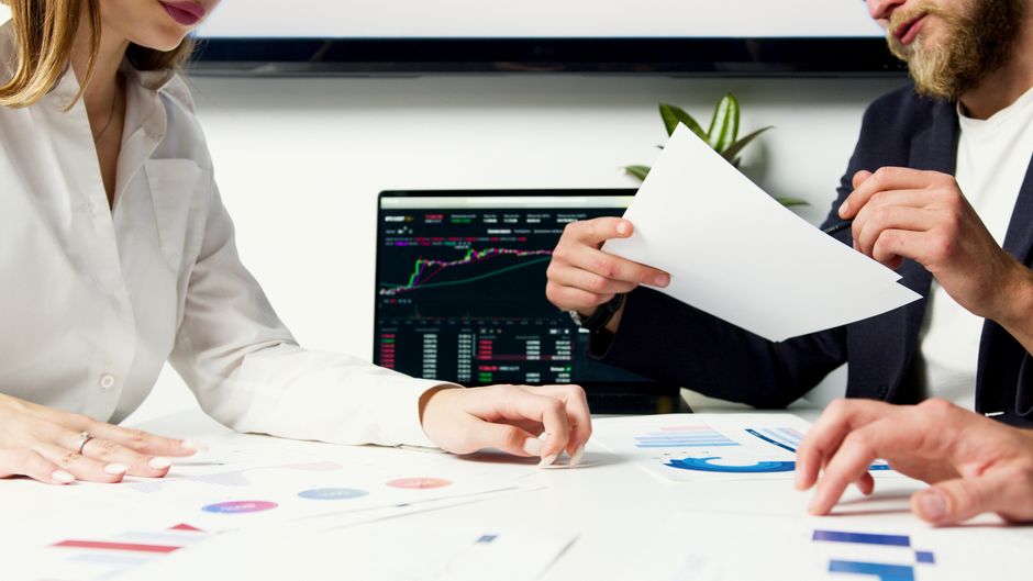 Capital-markets teams compare operating results with financing conditions before an offering.
